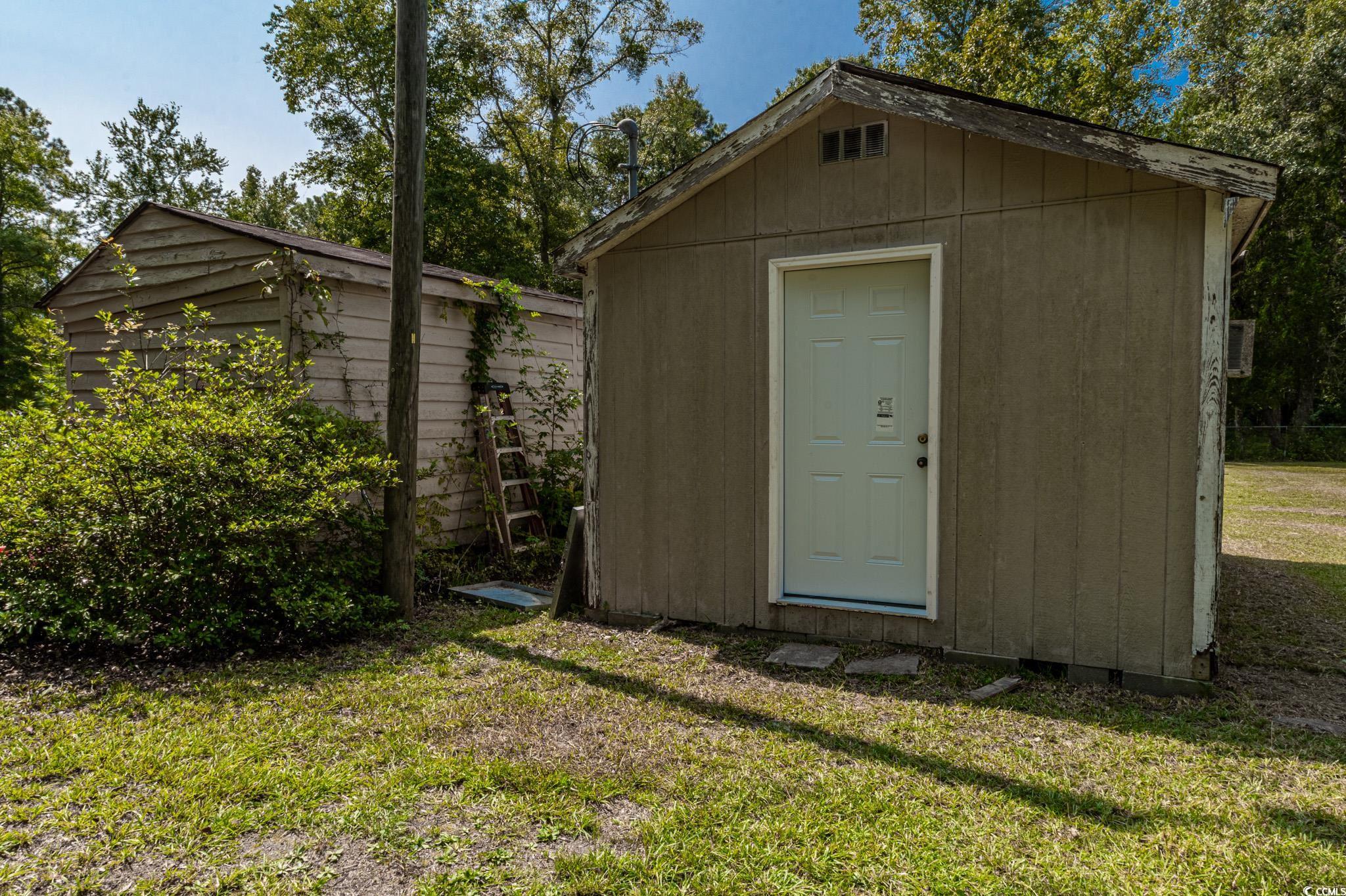 2150 Hazel Road Conway, SC 29526 - Photo 26 of 28 View of outdoor structure with a lawn