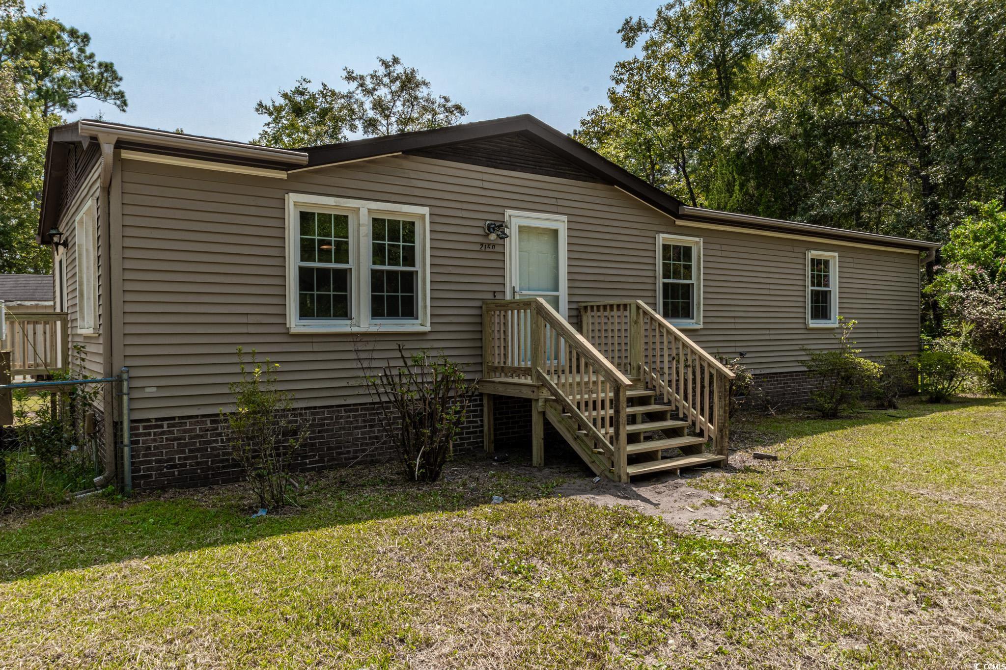 2150 Hazel Road Conway, SC 29526 - Photo 27 of 28 View of front of home with a front lawn