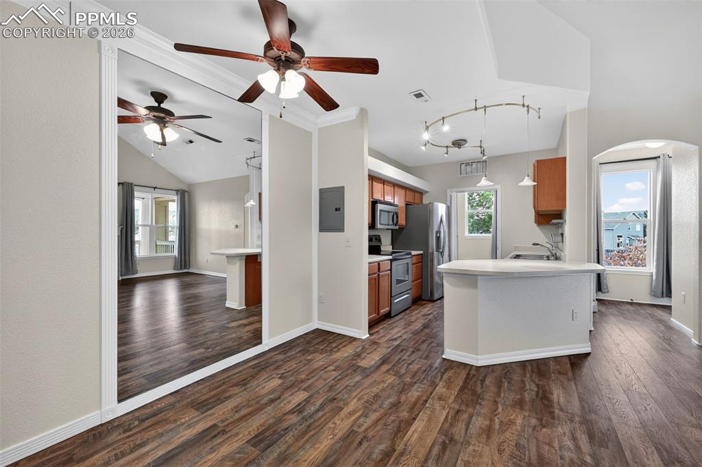 5378 Palomino Ranch Point, Unit 208 Colorado Springs, CO 80922 - Photo 17 of 38 a view interior of a house and kitchen view with wooden floor