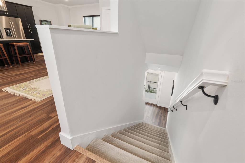 2601 Southwest Williston Road, Unit 106 Gainesville, FL 32608 - Photo 15 of 82 a view of a hallway view with staircase