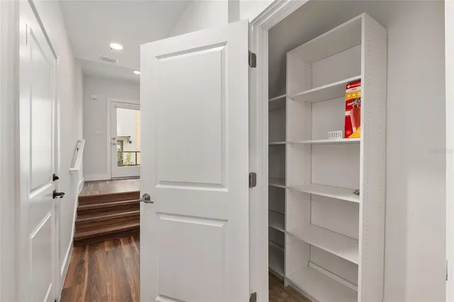 a view of a dining room with furniture and window