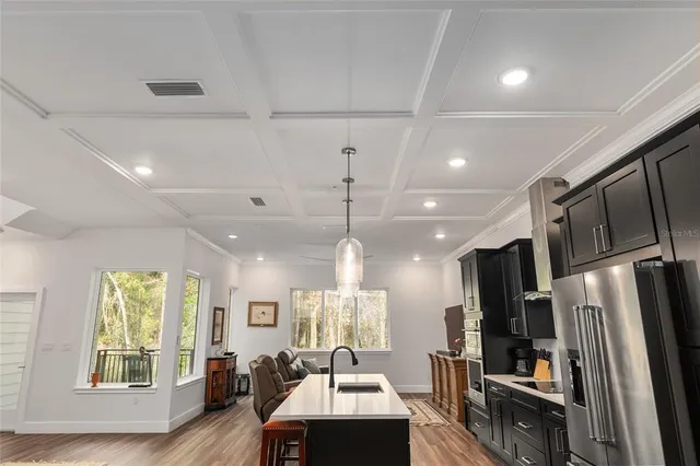 a view of balcony with wooden floor and outdoor seating