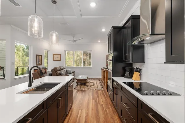 a view of a balcony with wooden floor and fence
