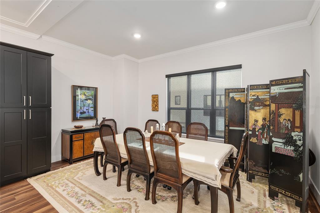 2601 Southwest Williston Road, Unit 106 Gainesville, FL 32608 - Photo 35 of 82 a view of a dining room with furniture and window