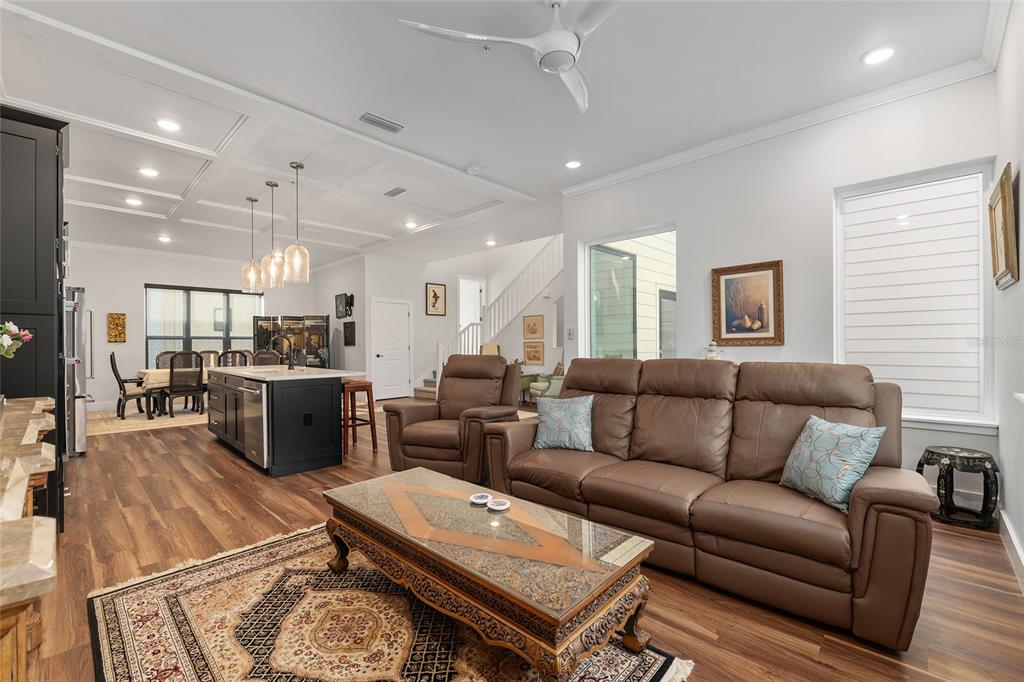 2601 Southwest Williston Road, Unit 106 Gainesville, FL 32608 - Photo 40 of 82 a living room with furniture kitchen view and a table