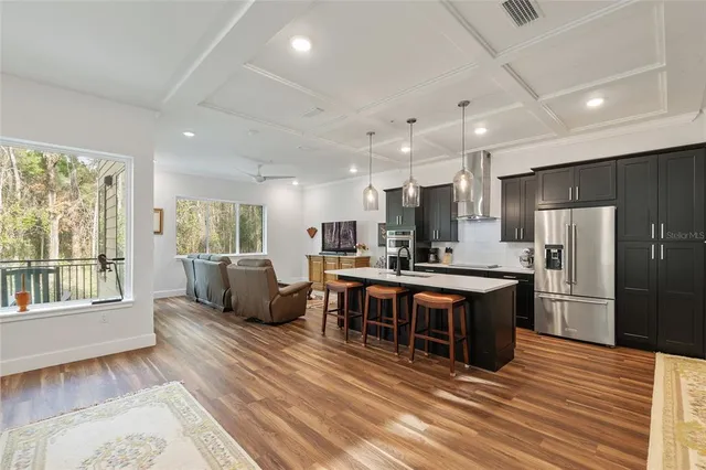 a utility room with sink dryer and washer
