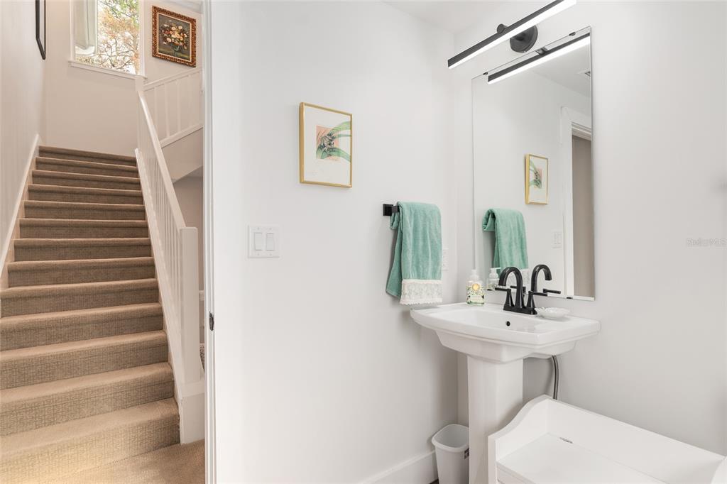 2601 Southwest Williston Road, Unit 106 Gainesville, FL 32608 - Photo 44 of 82 a bathroom with a sink and a mirror