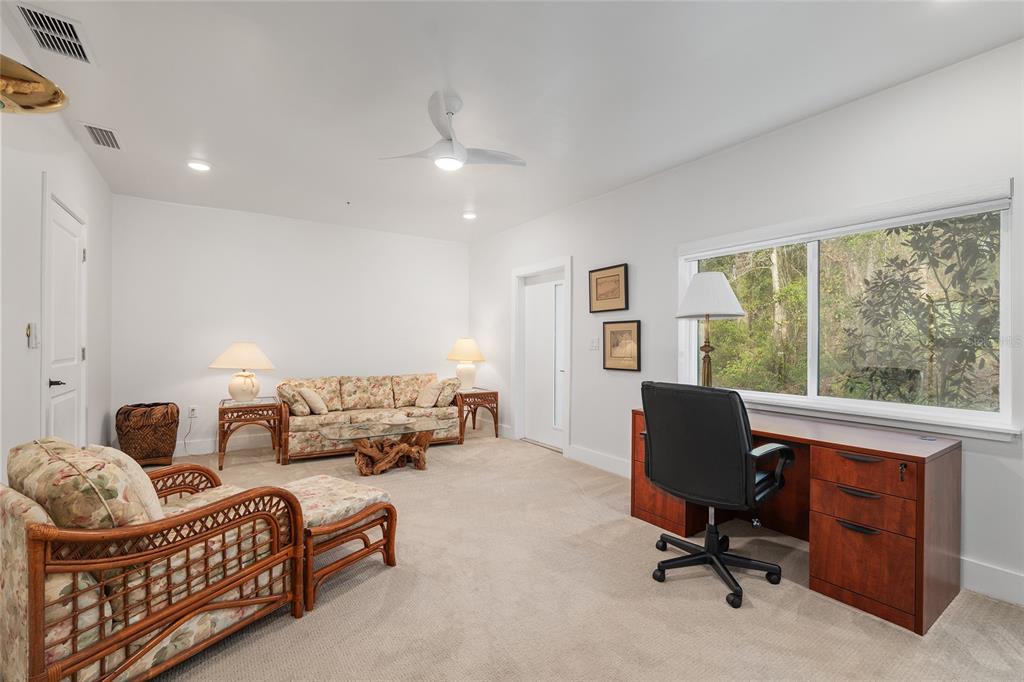 2601 Southwest Williston Road, Unit 106 Gainesville, FL 32608 - Photo 59 of 82 a living room with furniture