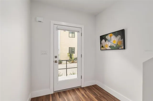 a view of a hallway view with staircase