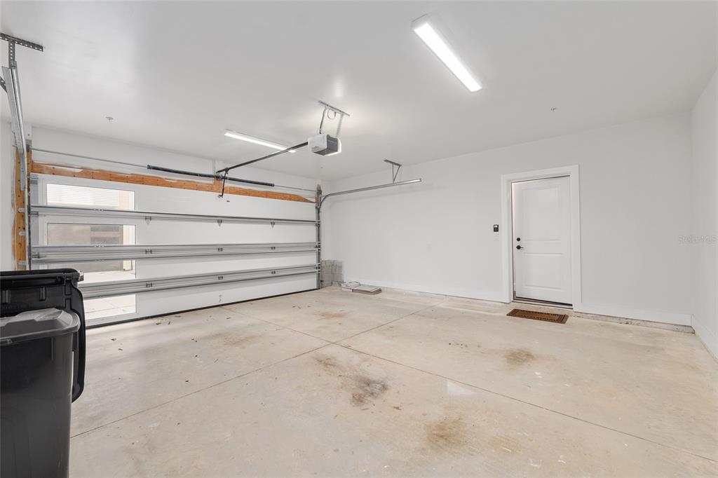 2601 Southwest Williston Road, Unit 106 Gainesville, FL 32608 - Photo 71 of 82 a view of an empty room with a window