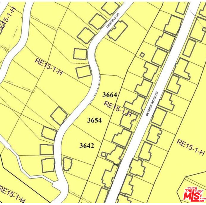 3664 Oakfield Drive Sherman Oaks, CA 91423 - Photo 5 of 17 a bathroom with a shower curtain