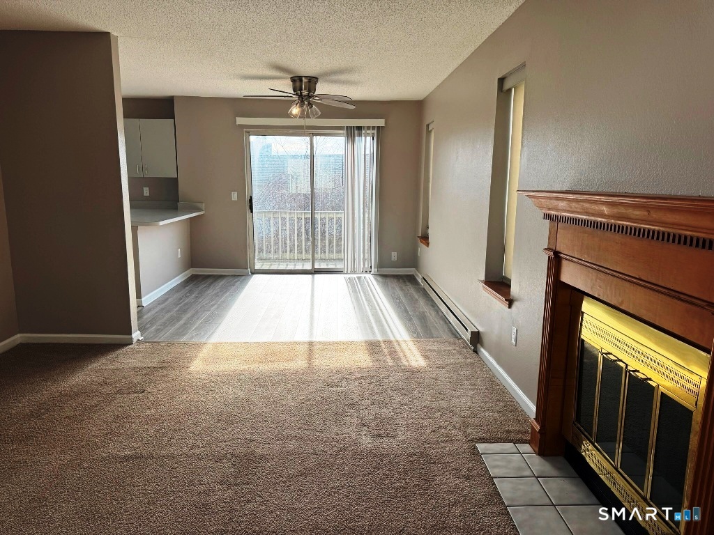 925 Oronoke Road, Unit 30L Waterbury, CT 06708 - Photo 2 of 21 a view of an empty room and window