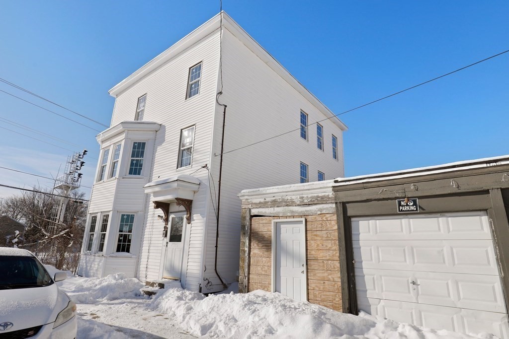 5 Temple Street Lawrence, MA 01843 - Photo 6 of 17 a view of a house with a outdoor space