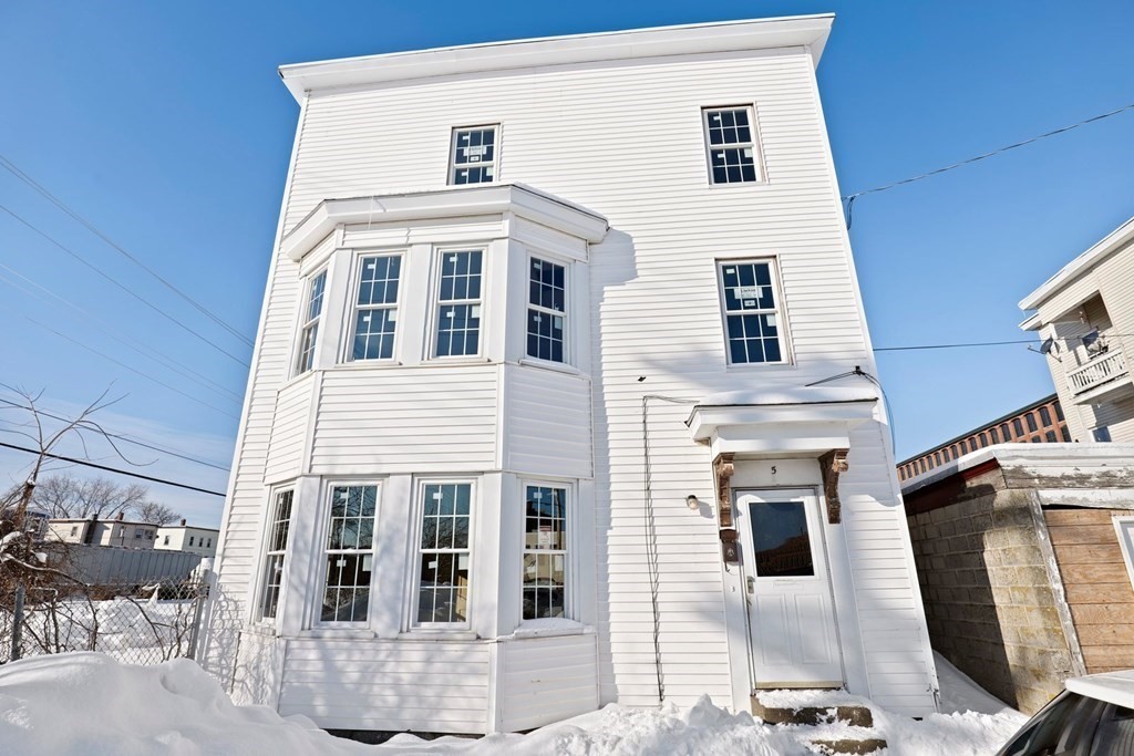 5 Temple Street Lawrence, MA 01843 - Photo 9 of 17 a front view of a large building