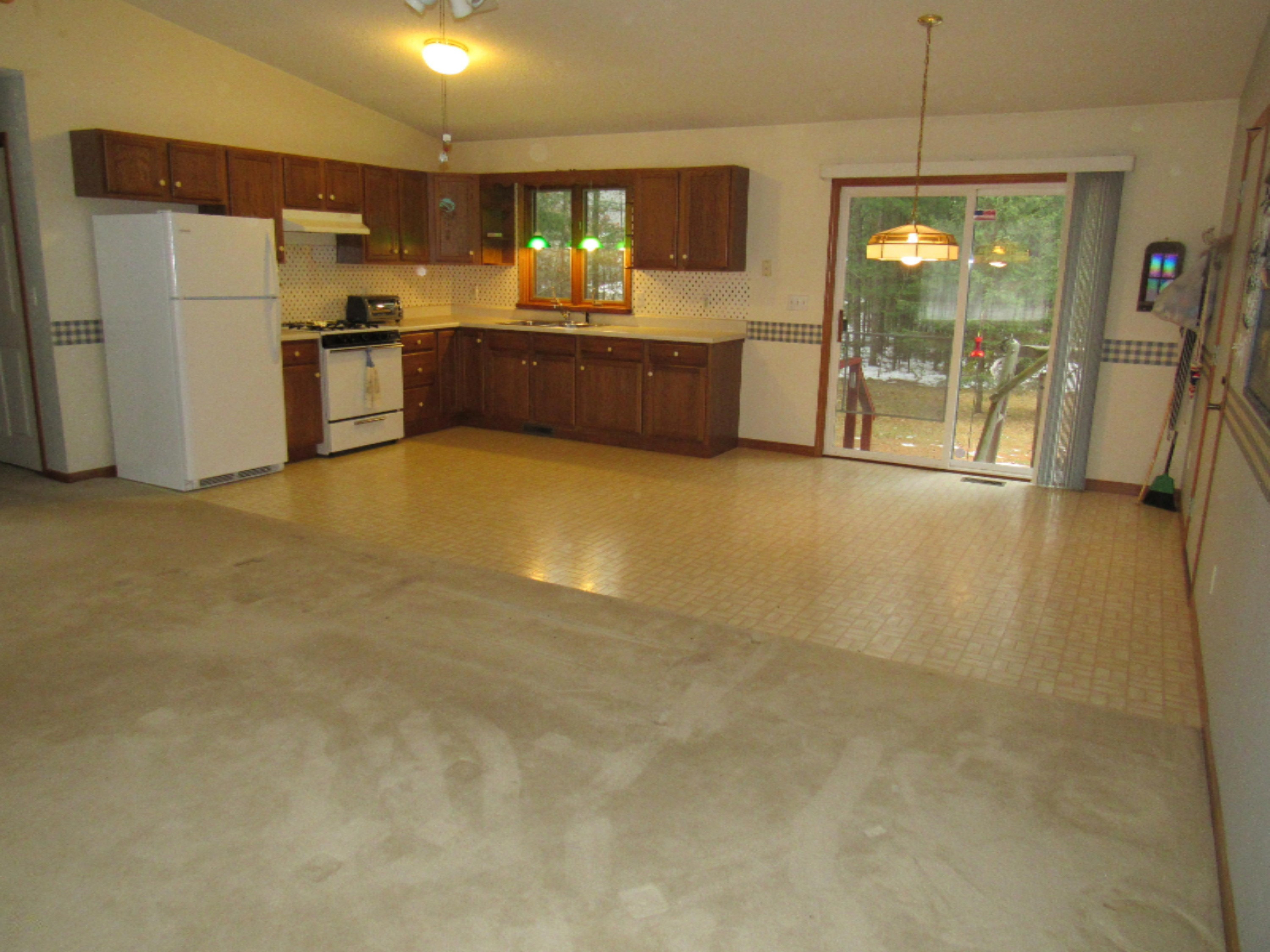 3958 Staple Road Muskegon, MI 49445 - Photo 6 of 18 Kitchen and Living Room