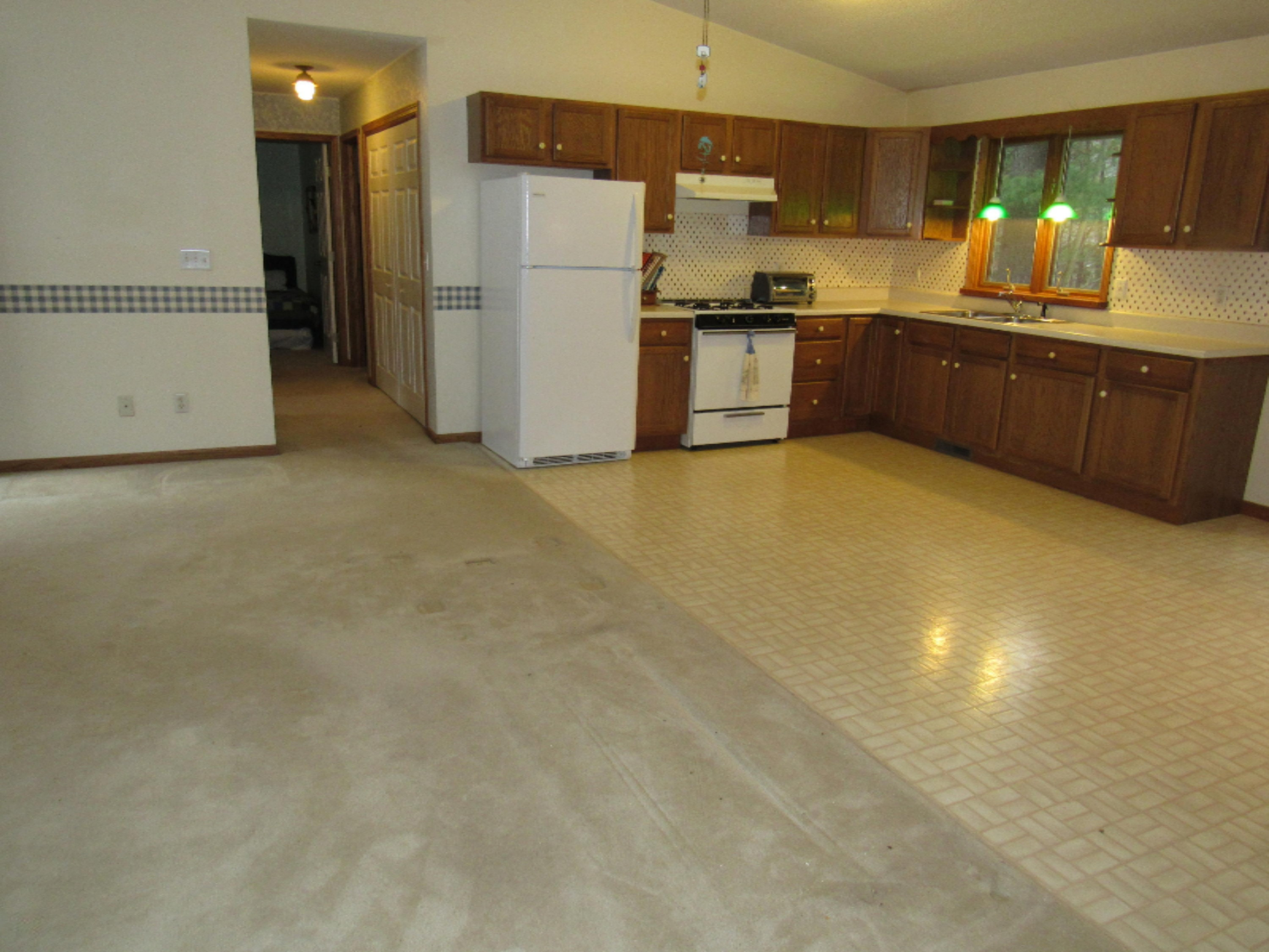 3958 Staple Road Muskegon, MI 49445 - Photo 7 of 18 Kitchen and Living Room