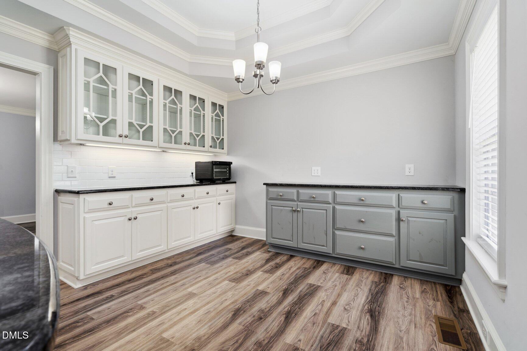 726 Thomas Road Rocky Mount, NC 27801 - Photo 17 of 55 a view of a bedroom with cabinet and stairs