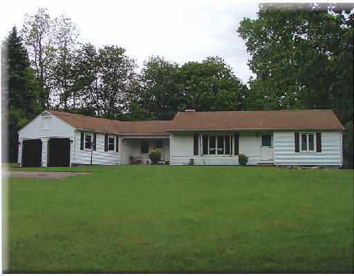 12 Birch Meadow Road Merrimac, MA 01860 - Photo 1 of 1 a front view of a house with a garden