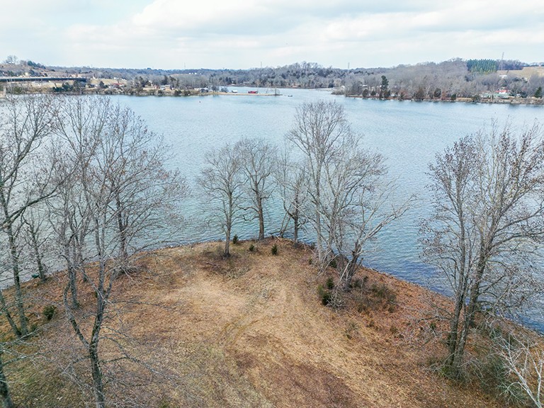 255 Cherokee Dock Road Lebanon, TN 37087 - Photo 7 of 10 a view of lake with a mountain in the background