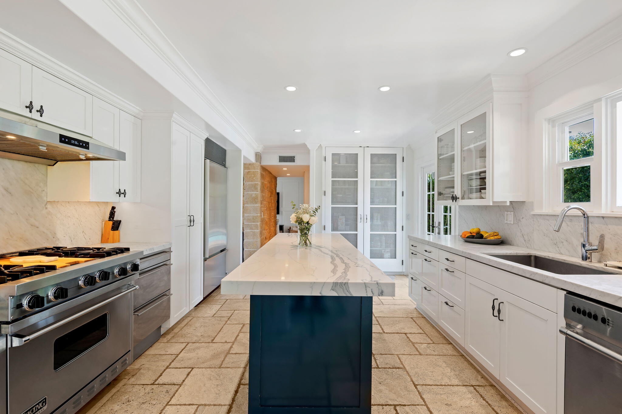 809 Willowglen Road Santa Barbara, CA 93105 - Photo 14 of 50 a kitchen with stainless steel appliances a sink stove and cabinets