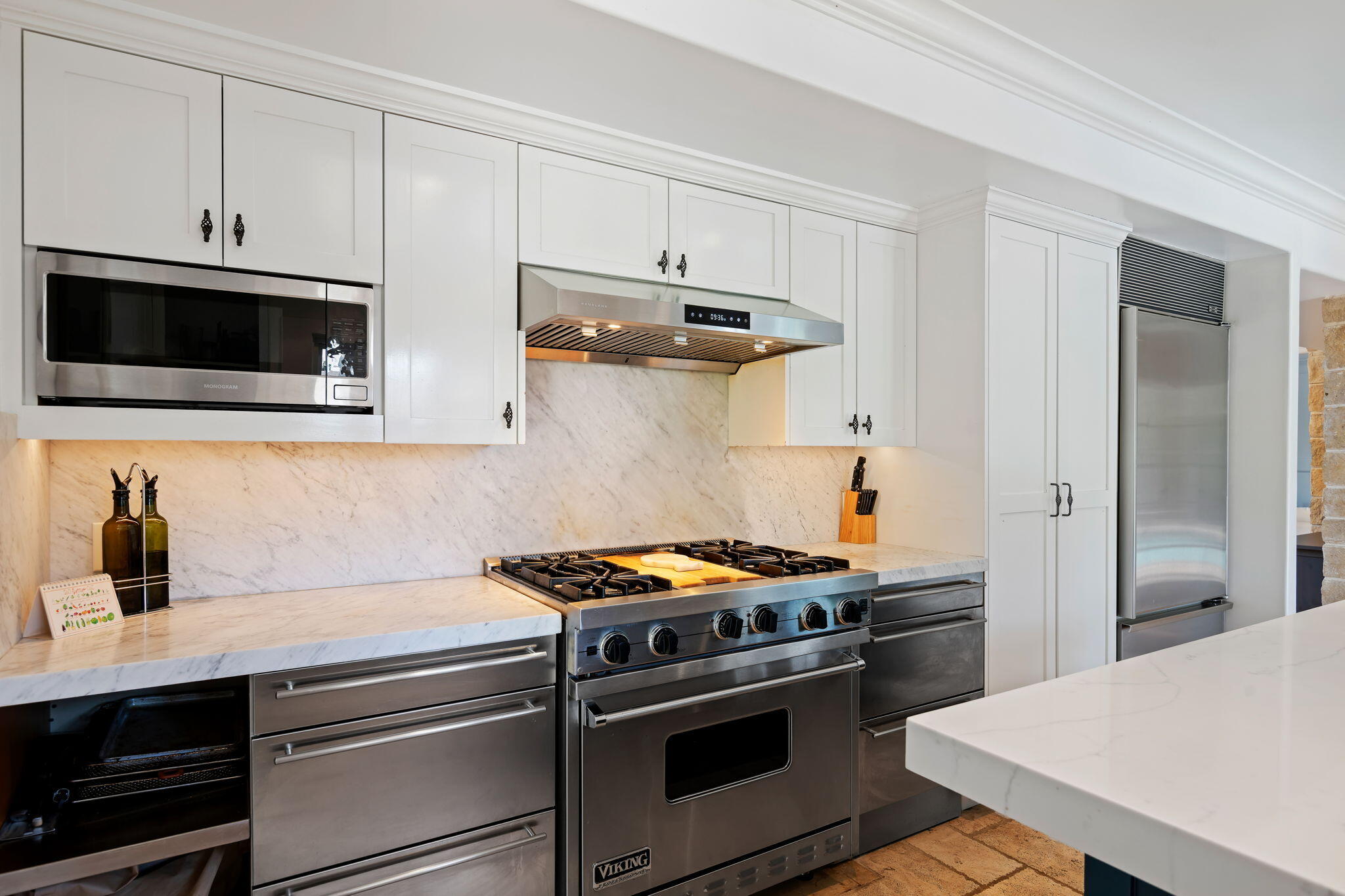 809 Willowglen Road Santa Barbara, CA 93105 - Photo 15 of 50 a kitchen with cabinets and steel stainless steel appliances