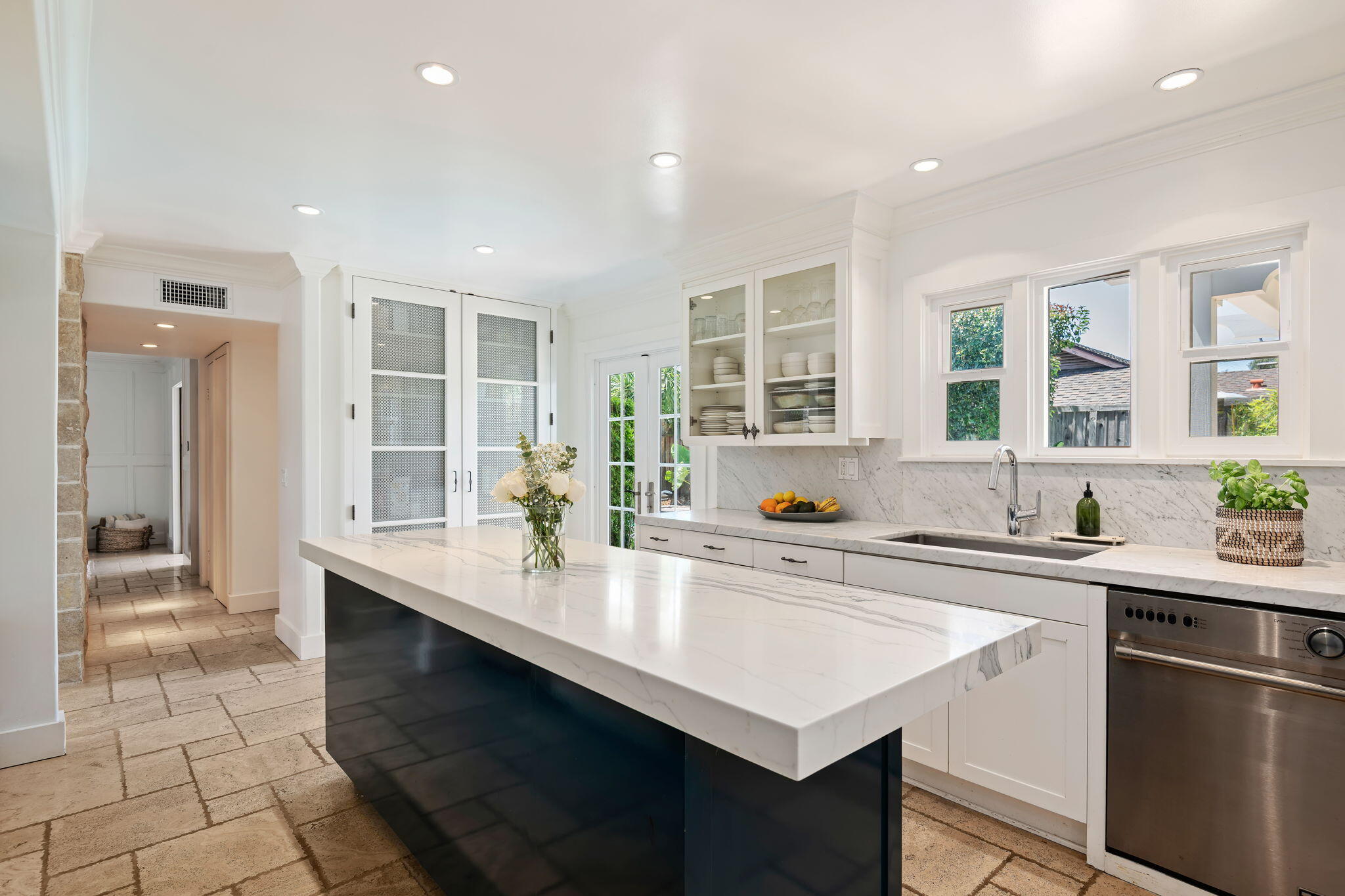809 Willowglen Road Santa Barbara, CA 93105 - Photo 16 of 50 a kitchen with stainless steel appliances a sink a stove a refrigerator and cabinets