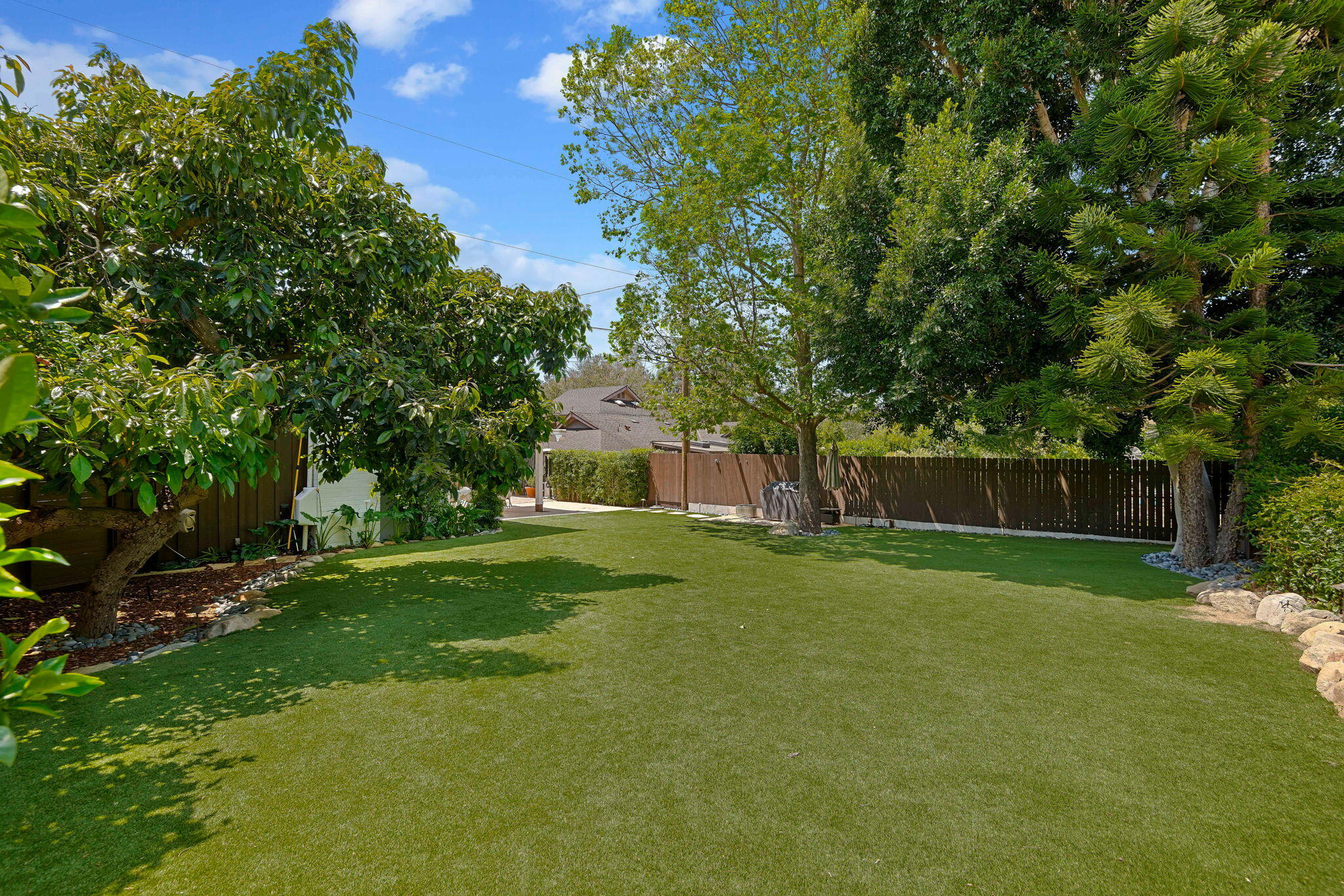 809 Willowglen Road Santa Barbara, CA 93105 - Photo 29 of 50 a view of a big yard with plants and large trees