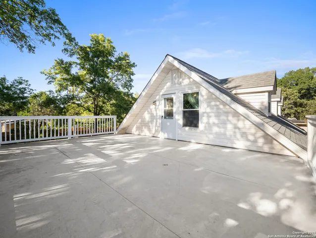 a view of a house with a street