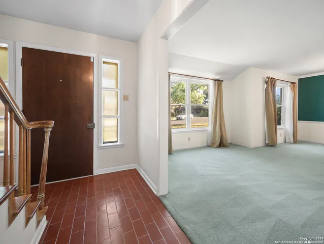 wooden floor and windows in a room