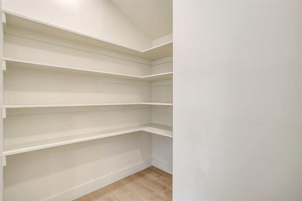 1432 Mount Gilead Road Keller, TX 76262 - Photo 13 of 40 a view of walk in closet with empty racks