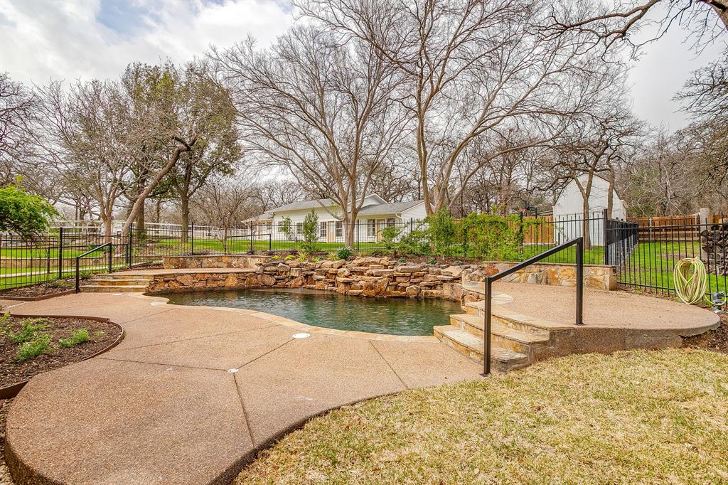 1432 Mount Gilead Road Keller, TX 76262 - Photo 31 of 40 a view of a swimming pool with a patio