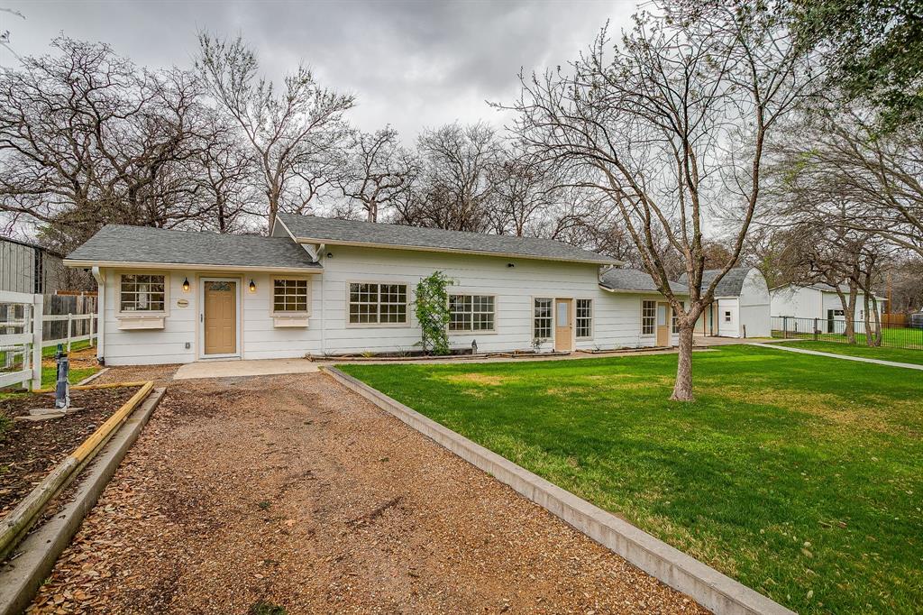 1432 Mount Gilead Road Keller, TX 76262 - Photo 33 of 40 a view of a yard in front of a house with plants and large tree