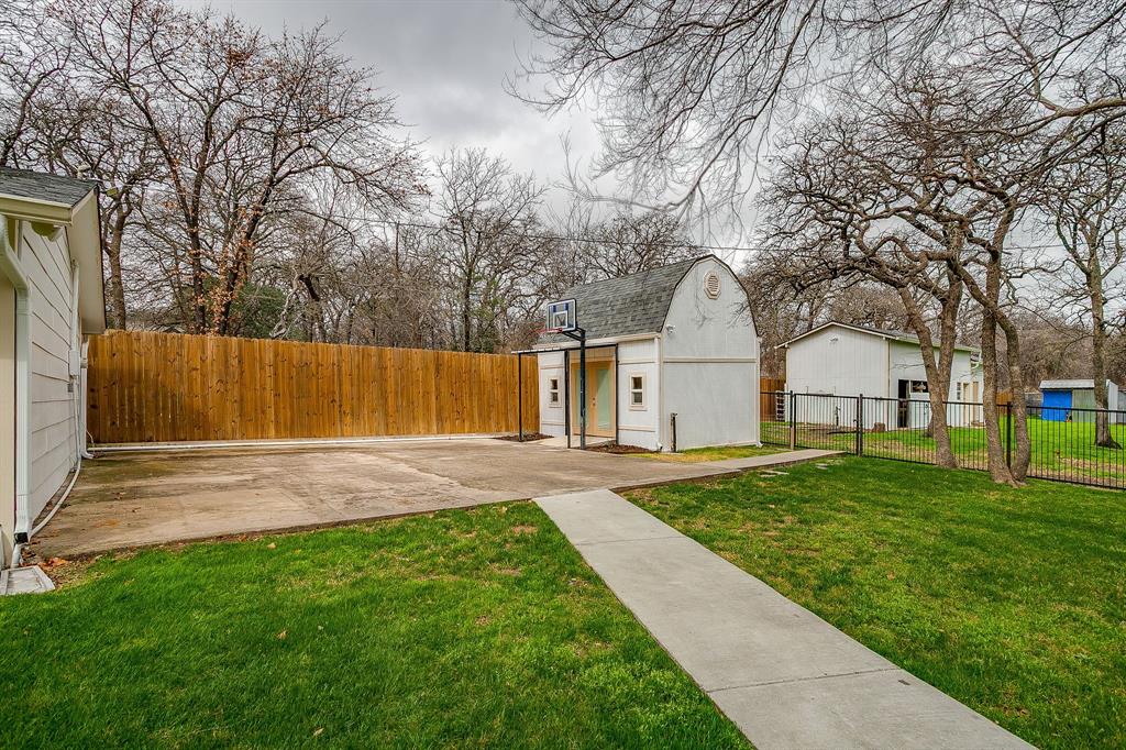 1432 Mount Gilead Road Keller, TX 76262 - Photo 37 of 40 a front view of a house with a yard and garage