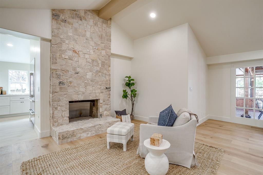 1432 Mount Gilead Road Keller, TX 76262 - Photo 8 of 40 a living room with furniture and a fireplace