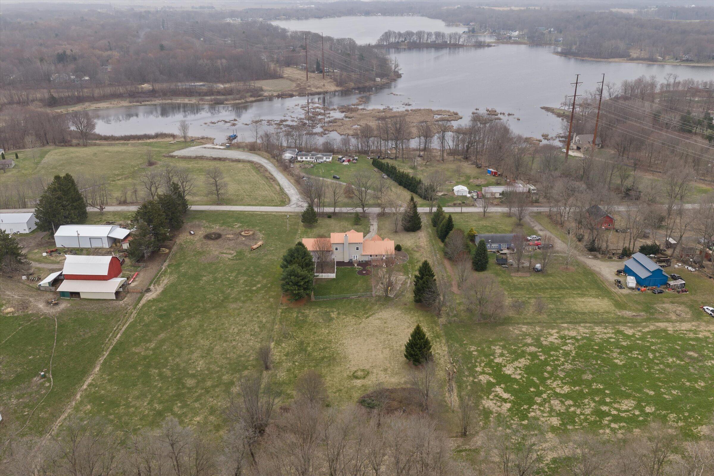 7692 North Emery Road Rolling Prairie, IN 46371 - Photo 63 of 69 a view of a lake view