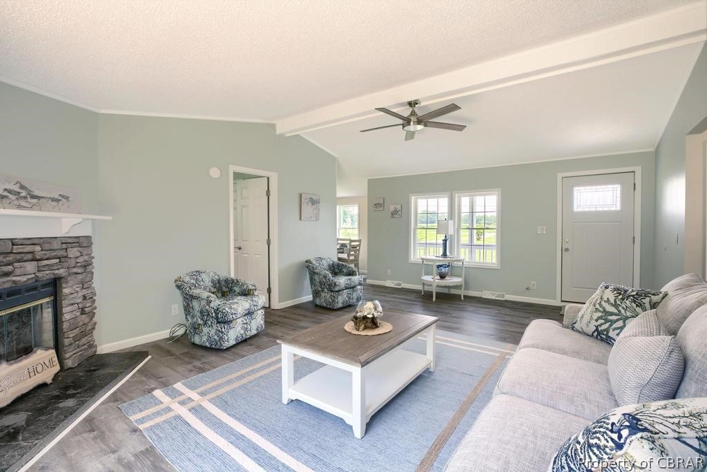 1626 Buckley Hall Road Dutton, VA 23050 - Photo 18 of 37 a living room with furniture and a fireplace