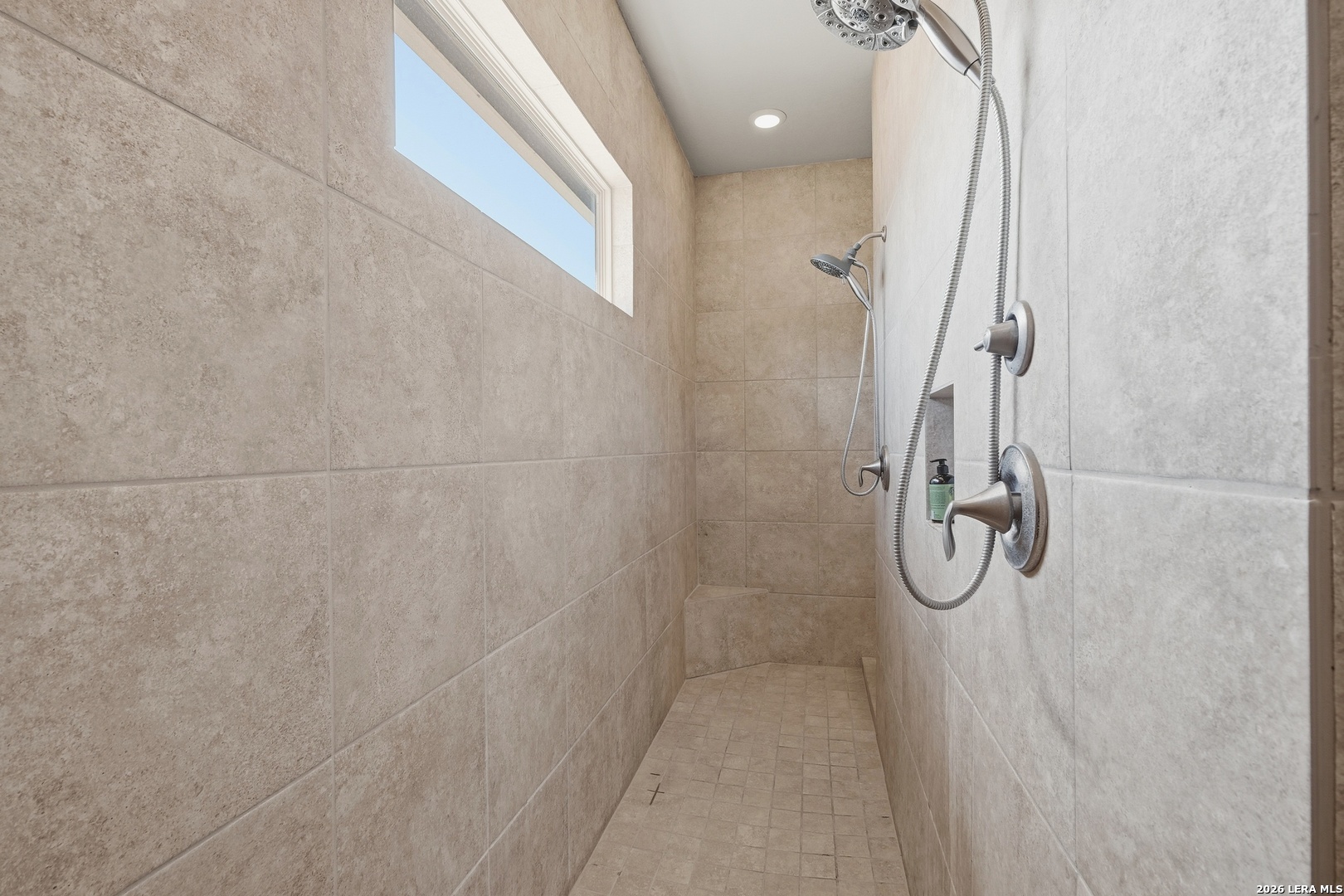 224 Mystic Shores Boulevard Spring Branch, TX 78070 - Photo 18 of 30 a bathroom with a shower