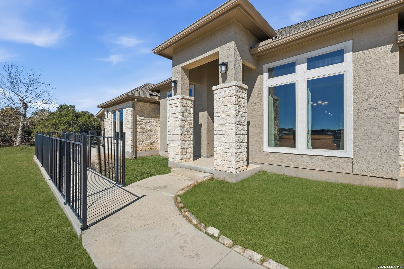 224 Mystic Shores Boulevard Spring Branch, TX 78070 - Photo 2 of 30 a view of a house with a backyard