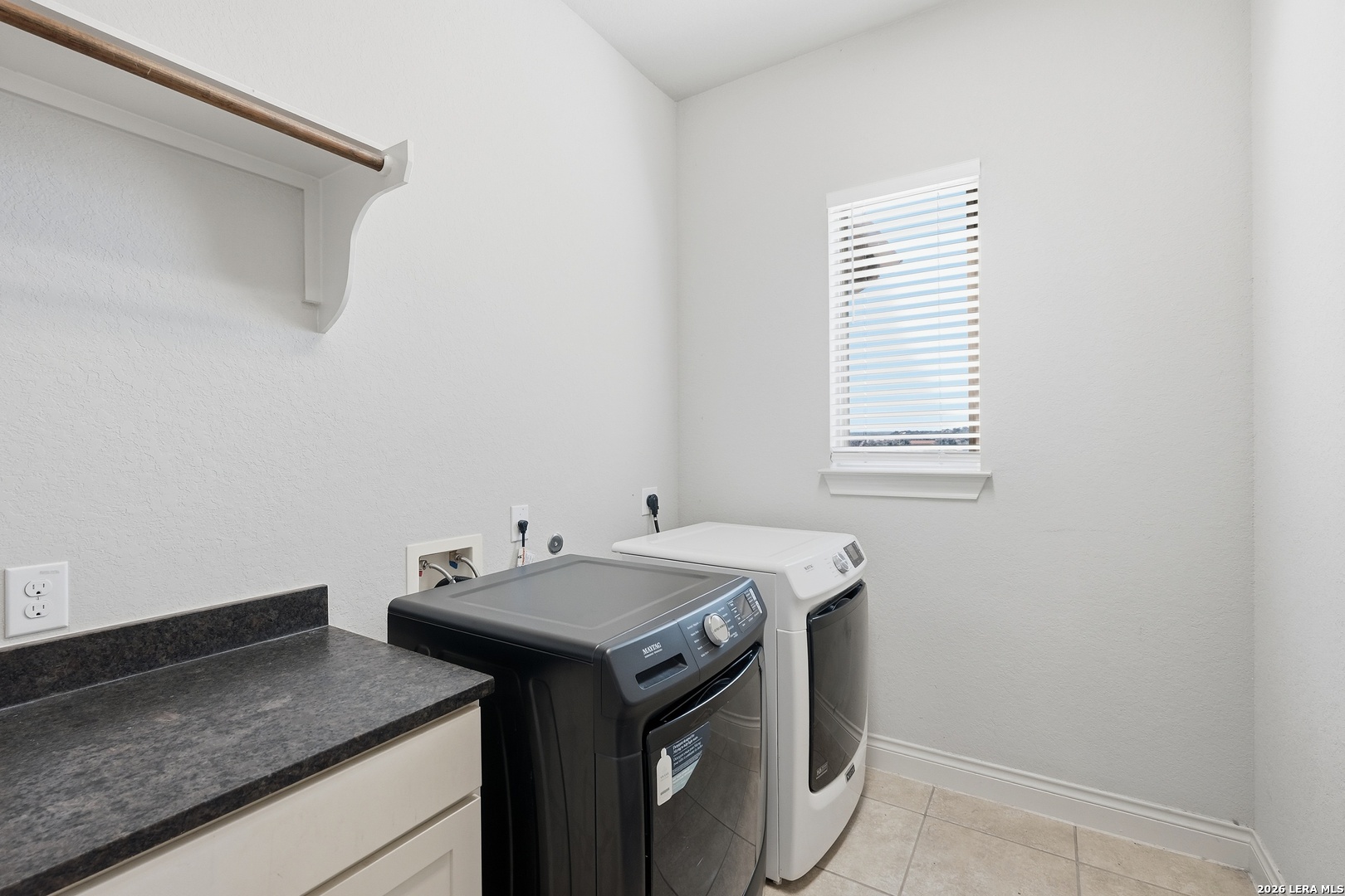 224 Mystic Shores Boulevard Spring Branch, TX 78070 - Photo 22 of 30 a utility room with dryer and washer