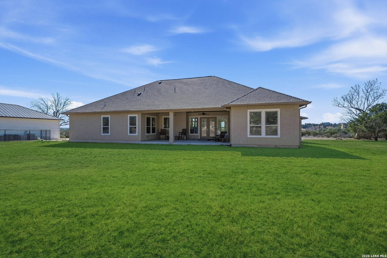 224 Mystic Shores Boulevard Spring Branch, TX 78070 - Photo 24 of 30 a view of a house with a big yard