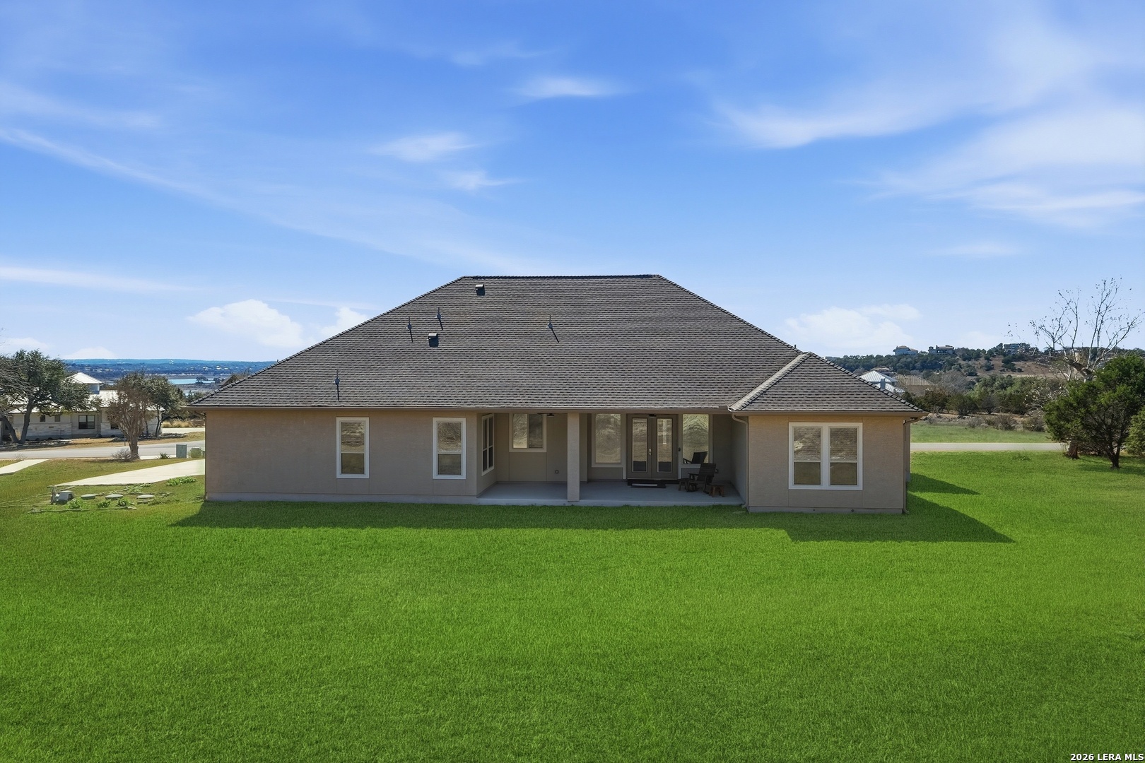 224 Mystic Shores Boulevard Spring Branch, TX 78070 - Photo 25 of 30 a view of a house with a big yard
