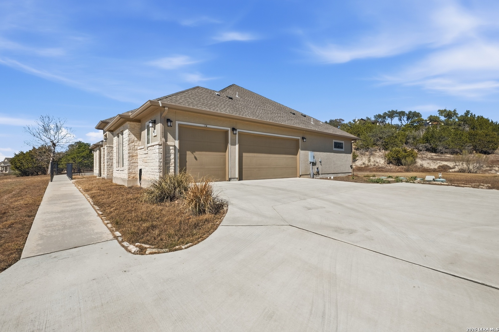 224 Mystic Shores Boulevard Spring Branch, TX 78070 - Photo 29 of 30 a front view of a house with a yard