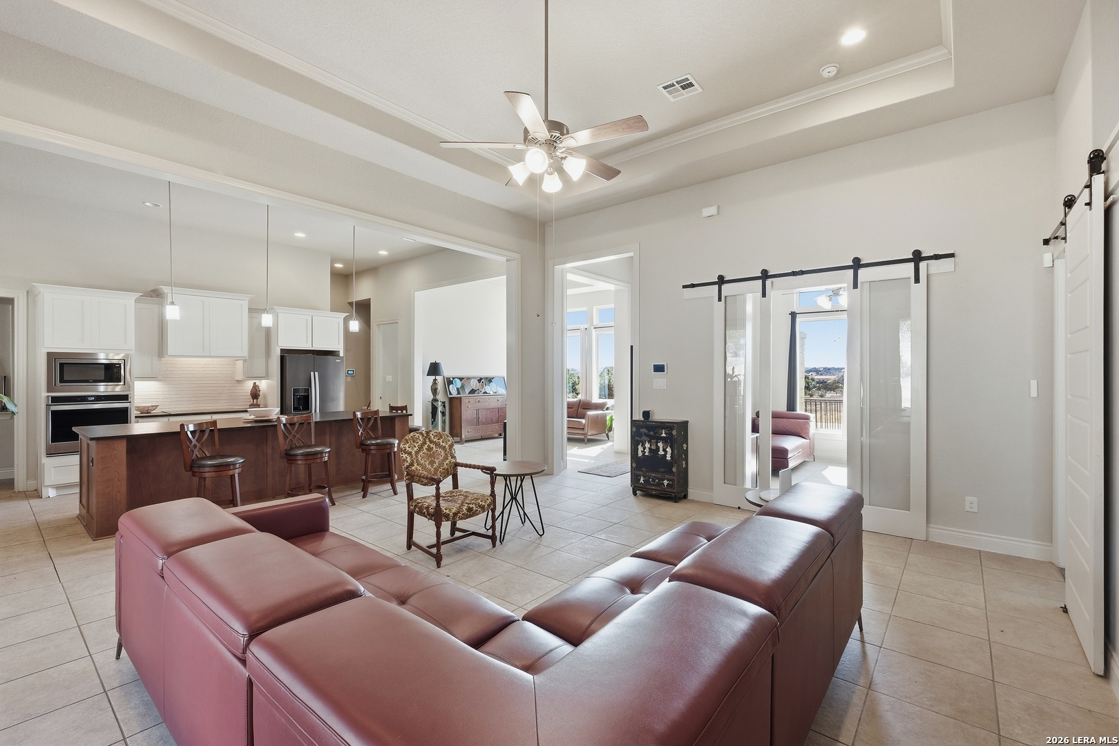 224 Mystic Shores Boulevard Spring Branch, TX 78070 - Photo 5 of 30 a living room with furniture and a view of kitchen