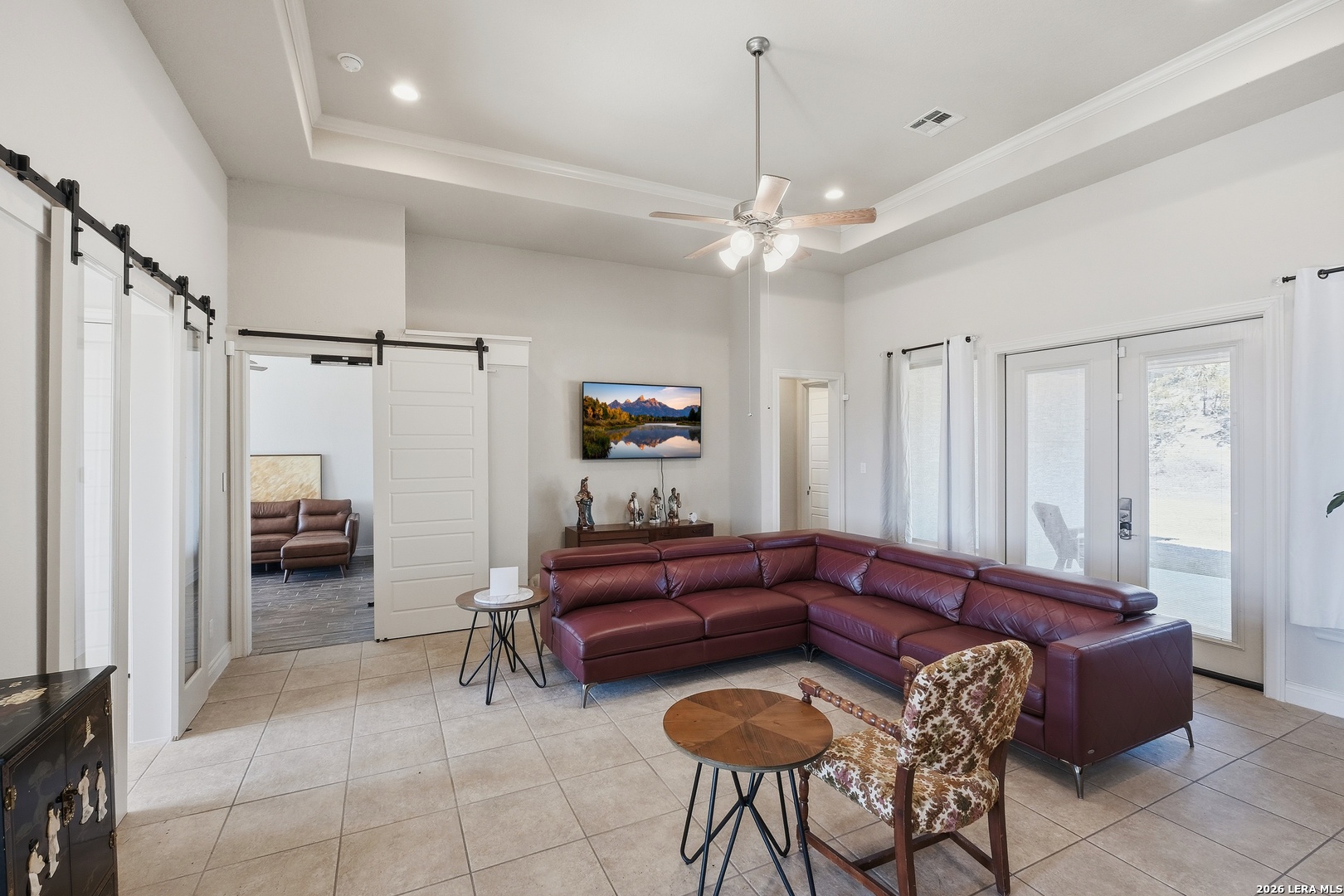 224 Mystic Shores Boulevard Spring Branch, TX 78070 - Photo 6 of 30 a living room with furniture and a chandelier