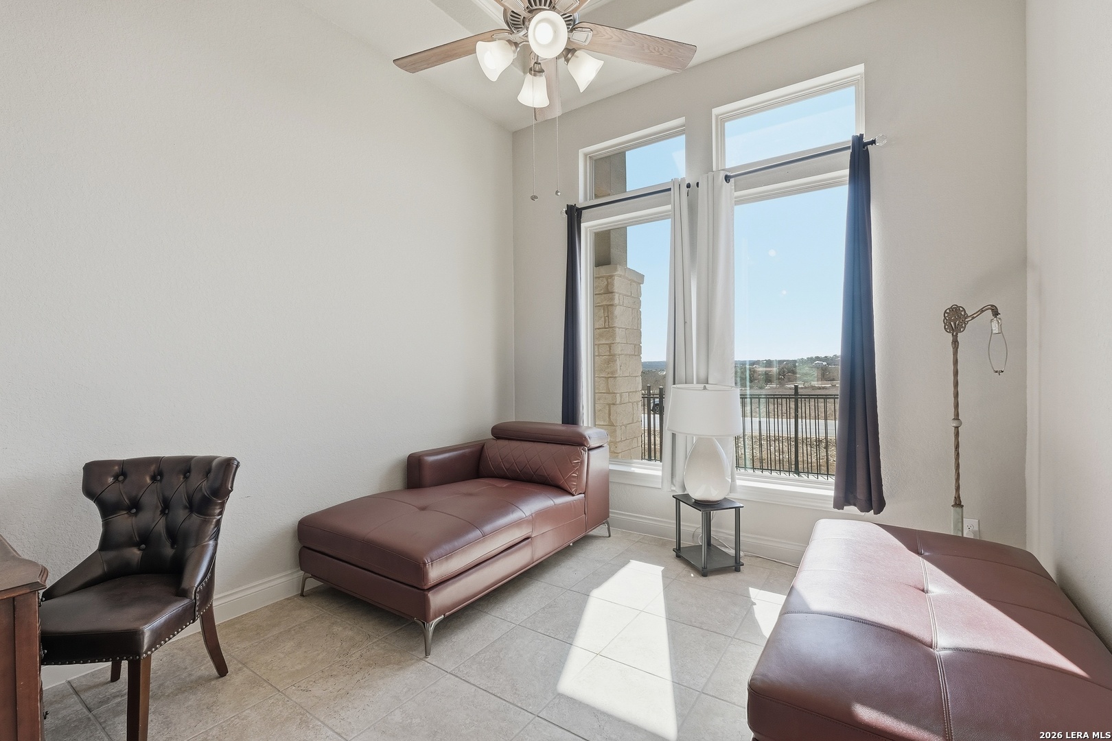 224 Mystic Shores Boulevard Spring Branch, TX 78070 - Photo 10 of 30 a living room with furniture and a large window