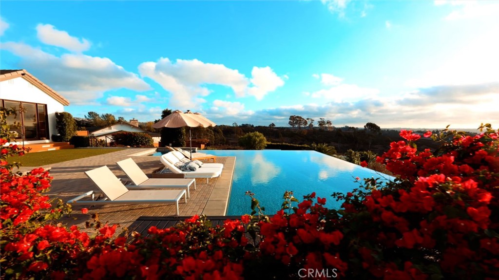 a view of yard with an outdoor seating