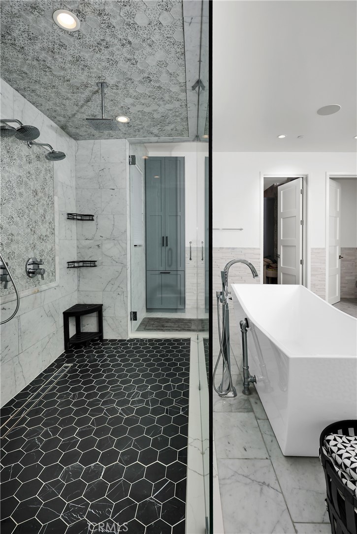 16582 Rio Vista Road San Diego, CA 92127 - Photo 21 of 49 a bathroom with a sink and a mirror