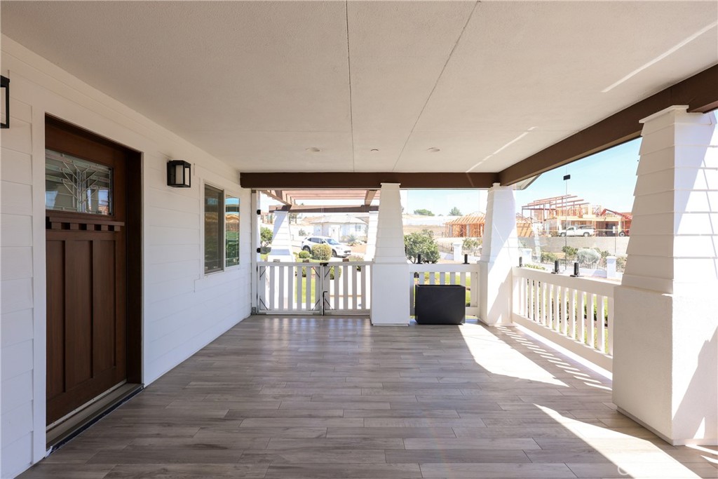 16582 Rio Vista Road San Diego, CA 92127 - Photo 41 of 49 a view of a room with wooden floor