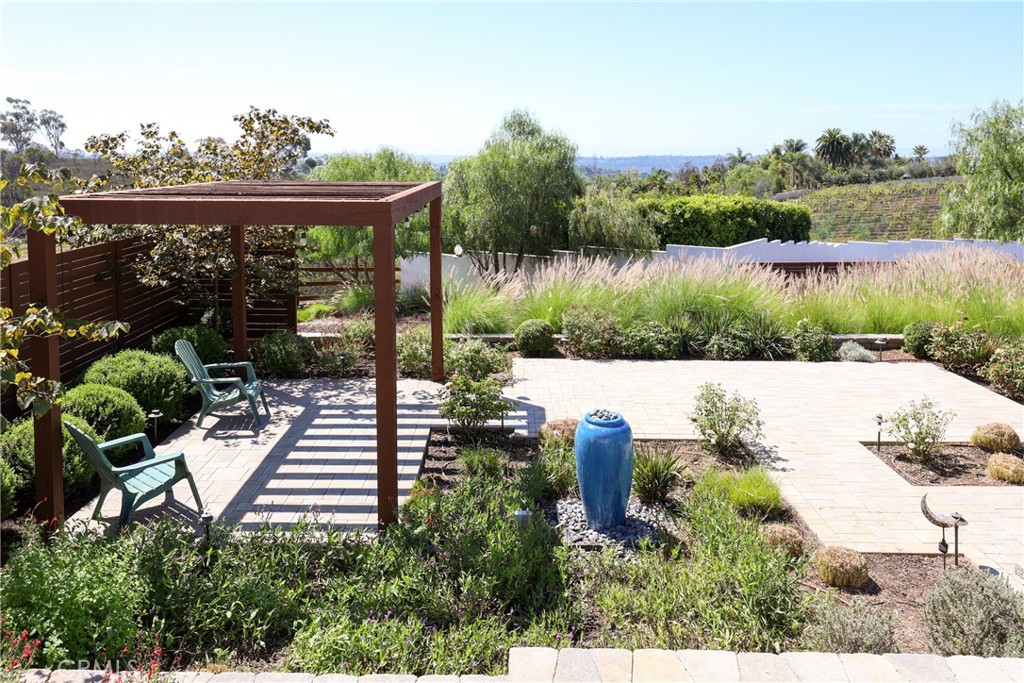 16582 Rio Vista Road San Diego, CA 92127 - Photo 47 of 49 a view of a swimming pool with a patio