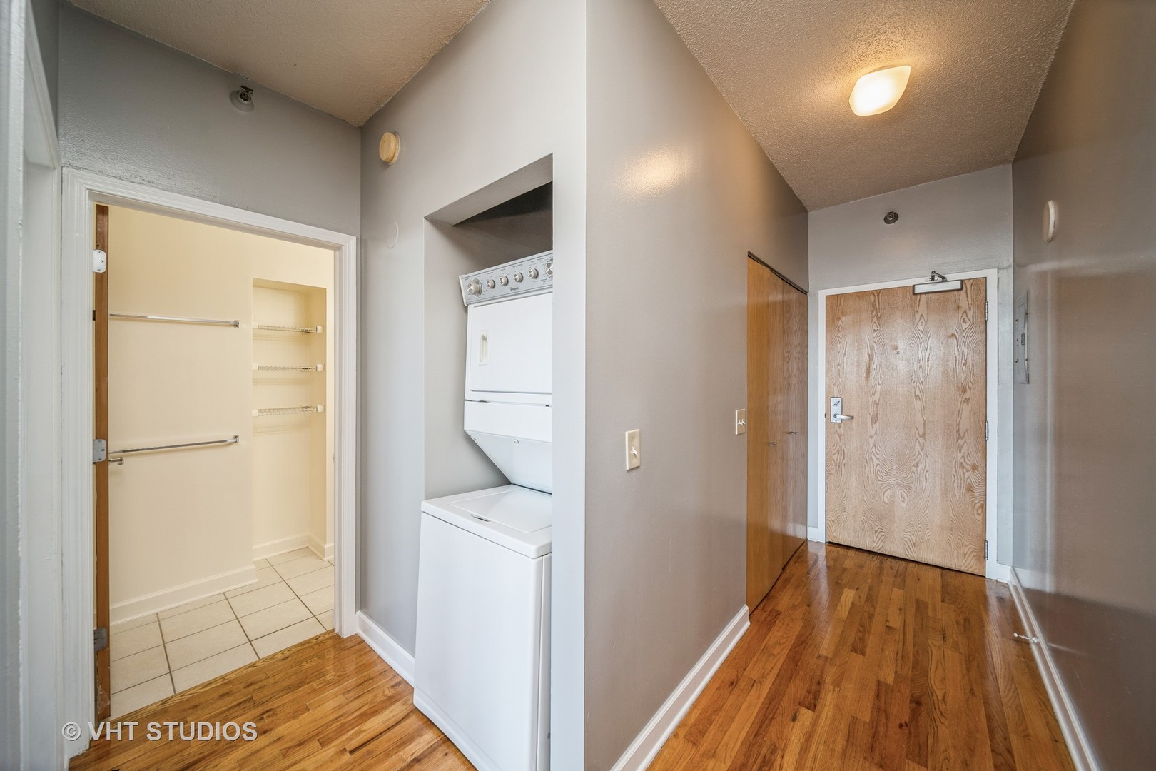 1529 South State Street, Unit 11F Chicago, IL 60605 - Photo 9 of 14 a view of hallway with wooden floor